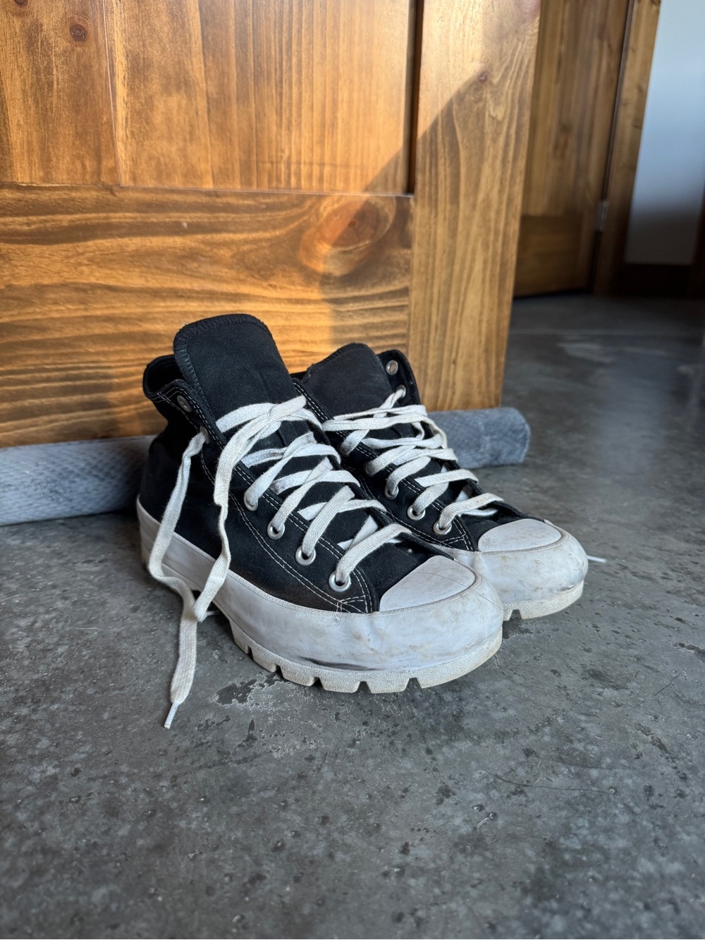 Black High-Top Converse Platform Sneakers
